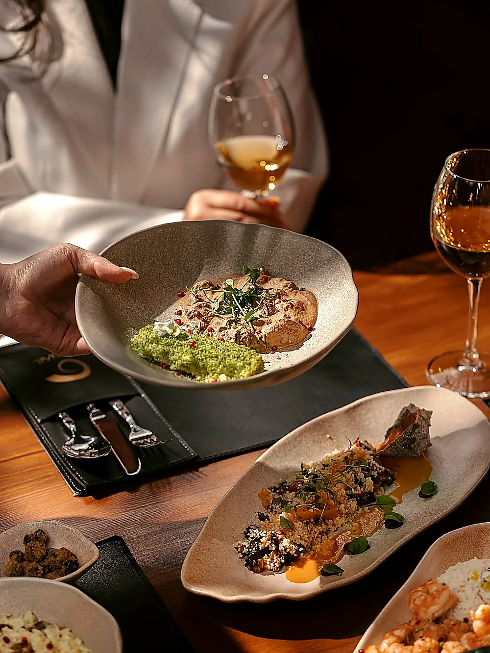 G SNAIL dishes served at the table